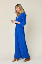 Double Take Full Size Surplice Wide Leg Jumpsuit with Pockets OutfitFlow